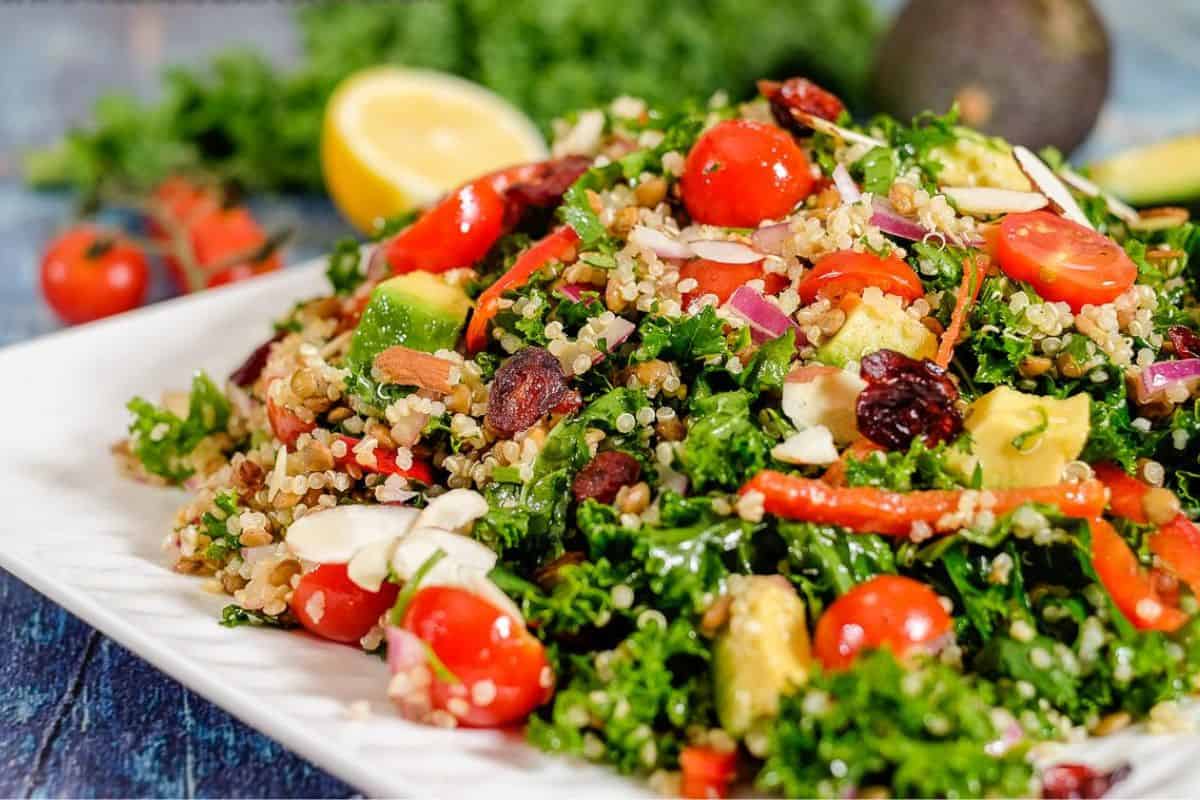 Close view of quinoa salad with lentils and kale.